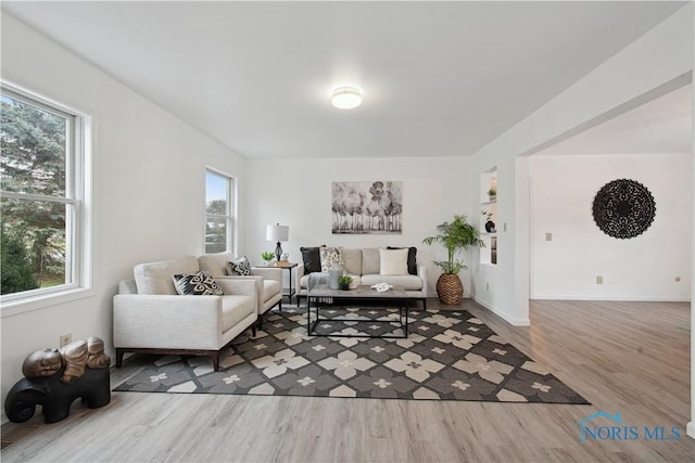 1004 Waterville Monclova Rd, Waterville, OH 43566 - living area featuring baseboards and wood finished floors