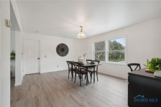 1004 Waterville Monclova Rd, Waterville, OH 43566 - dining area featuring baseboards and light wood-style flooring