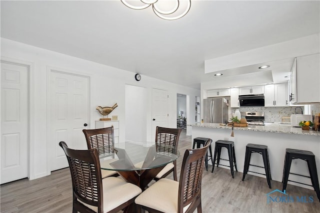 1004 Waterville Monclova Rd, Waterville, OH 43566 - dining area featuring recessed lighting and light wood-type flooring