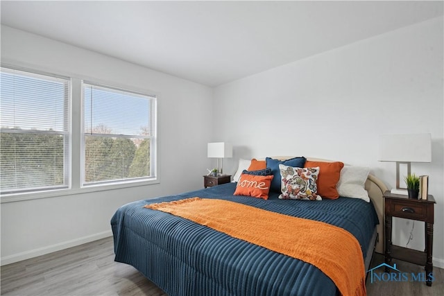 1004 Waterville Monclova Rd, Waterville, OH 43566 - bedroom with baseboards and wood finished floors