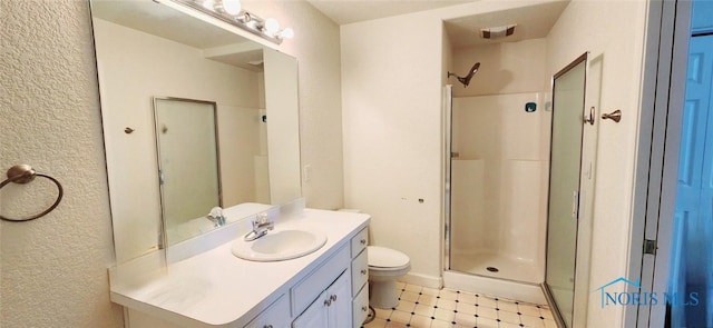 2249 Woods Edge Ct, Toledo, OH 43615 - bathroom with tile patterned floors, a stall shower, toilet, and vanity