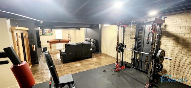 2249 Woods Edge Ct, Toledo, OH 43615 - exercise area featuring brick wall
