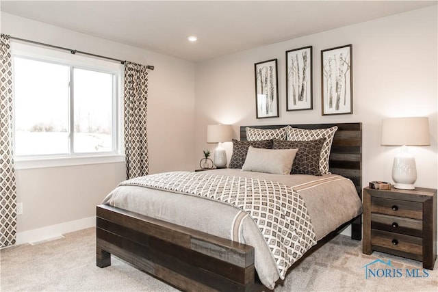 carpeted bedroom featuring recessed lighting and baseboards