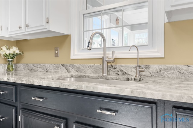 10132 Laplante Rd, Monclova, OH 43542 - kitchen with light countertops and white cabinets