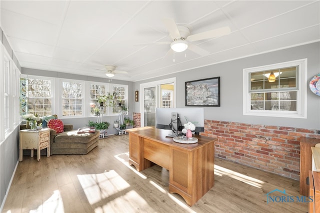 10132 Laplante Rd, Monclova, OH 43542 - office area featuring ceiling fan, light wood-style floors, and brick wall