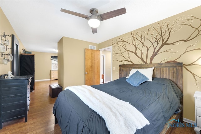 10132 Laplante Rd, Monclova, OH 43542 - bedroom with wood finished floors and a ceiling fan