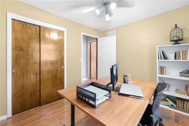 10132 Laplante Rd, Monclova, OH 43542 - office with a ceiling fan and wood finished floors