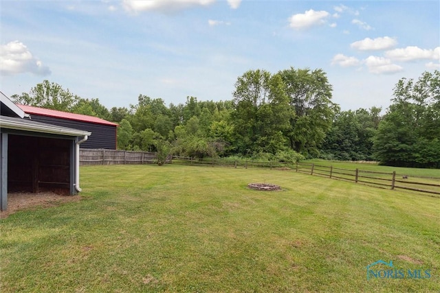 10132 Laplante Rd, Monclova, OH 43542 - view of yard with an outdoor fire pit