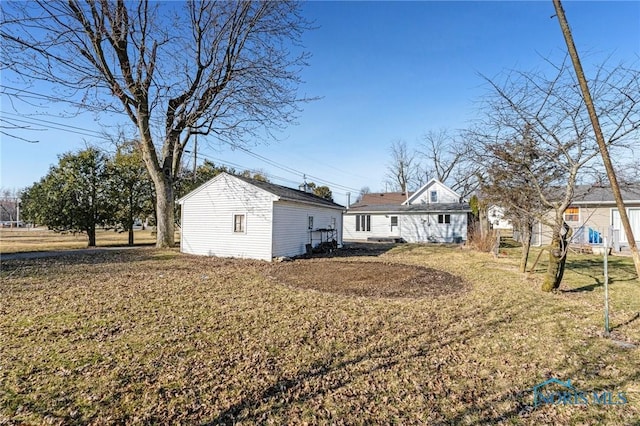 exterior space with a yard