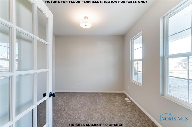 unfurnished room with visible vents, baseboards, and carpet floors