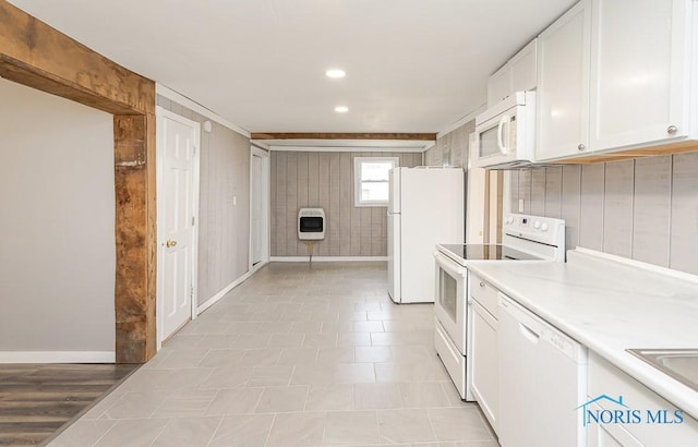 kitchen with light countertops, white appliances, baseboards, recessed lighting, and white cabinetry