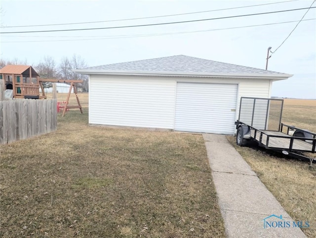 garage with fence