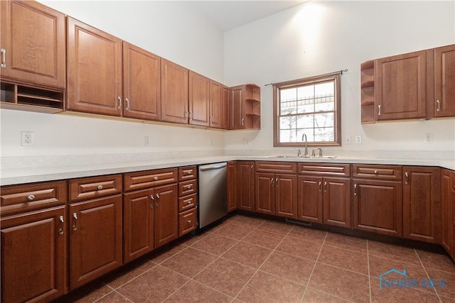 2121 County Road 4 Unit 1, Swanton, OH 43558 - kitchen featuring open shelves, dark tile patterned flooring, a sink, light countertops, and stainless steel dishwasher