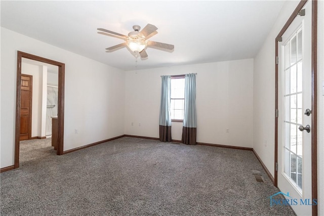 2121 County Road 4 Unit 1, Swanton, OH 43558 - carpeted empty room with visible vents, baseboards, and ceiling fan