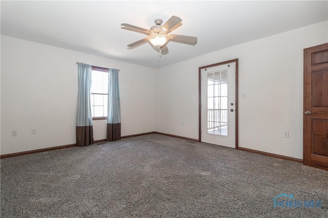 2121 County Road 4 Unit 1, Swanton, OH 43558 - empty room with a ceiling fan, carpet, and baseboards