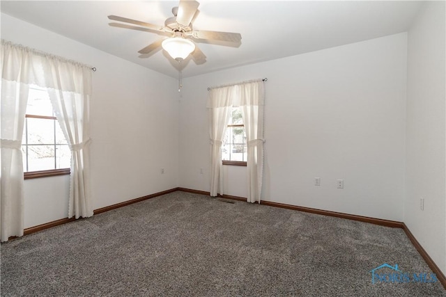 2121 County Road 4 Unit 1, Swanton, OH 43558 - empty room with carpet flooring, visible vents, baseboards, and ceiling fan