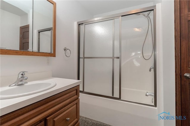 2121 County Road 4 Unit 1, Swanton, OH 43558 - full bath with vanity and shower / bath combination with glass door