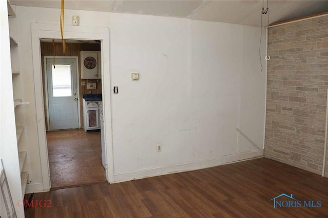 1142 Page St, Toledo, OH 43608 - unfurnished room featuring wood finished floors and baseboards