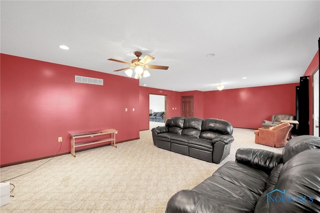 carpeted living area with visible vents, recessed lighting, baseboards, and ceiling fan