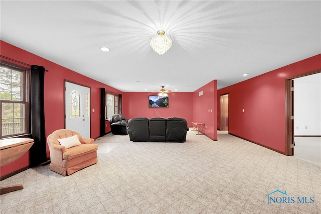 home theater room featuring recessed lighting, carpet, baseboards, and a wealth of natural light