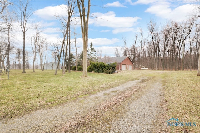 view of street featuring driveway