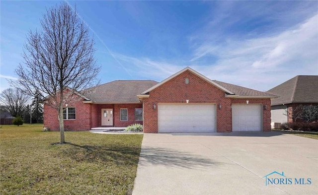 ranch-style house with brick siding, concrete driveway, a garage, and a front lawn