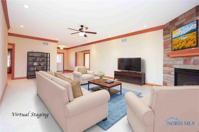 carpeted living room featuring crown molding, baseboards, ceiling fan, and visible vents