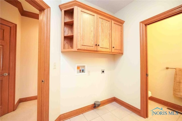 clothes washing area featuring hookup for a washing machine, hookup for an electric dryer, baseboards, and visible vents
