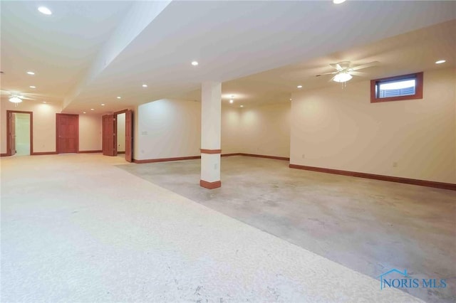 below grade area featuring baseboards, recessed lighting, and a ceiling fan