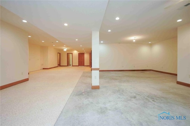 below grade area with baseboards, ceiling fan, and recessed lighting