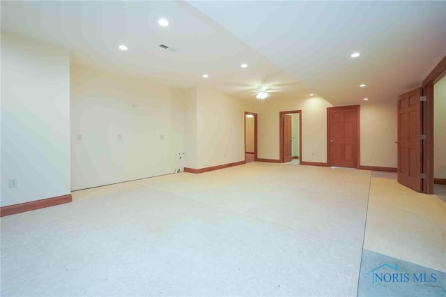 empty room featuring baseboards, visible vents, ceiling fan, and recessed lighting