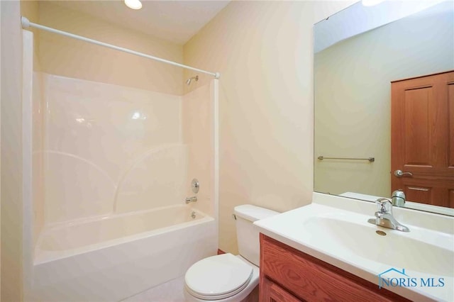full bathroom featuring shower / washtub combination, toilet, and vanity