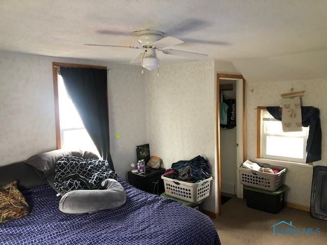 bedroom with carpet floors and ceiling fan