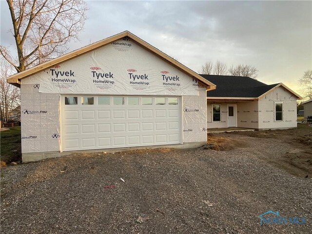 516 Ogen St, Hicksville, OH 43526 - property in mid-construction with a garage