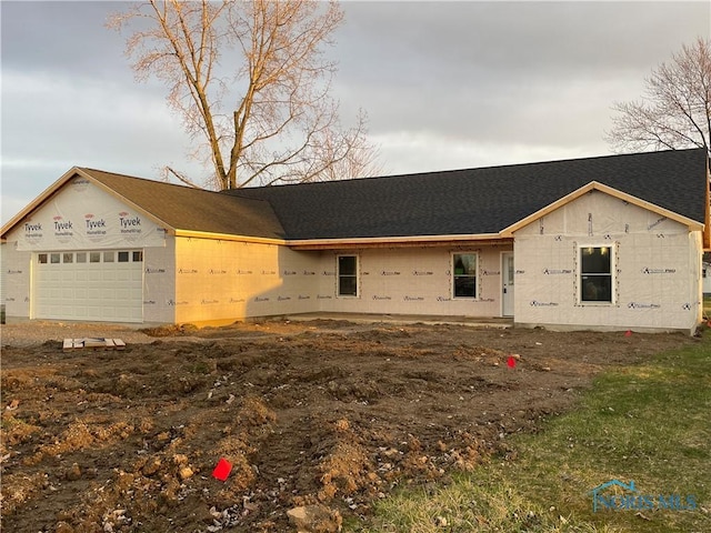 516 Ogen St, Hicksville, OH 43526 - property in mid-construction with a garage and roof with shingles