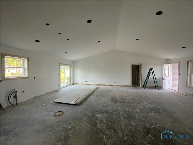 516 Ogen St, Hicksville, OH 43526 - unfurnished living room with lofted ceiling