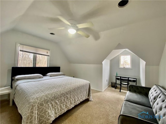 bedroom featuring baseboards, lofted ceiling, ceiling fan, and carpet flooring