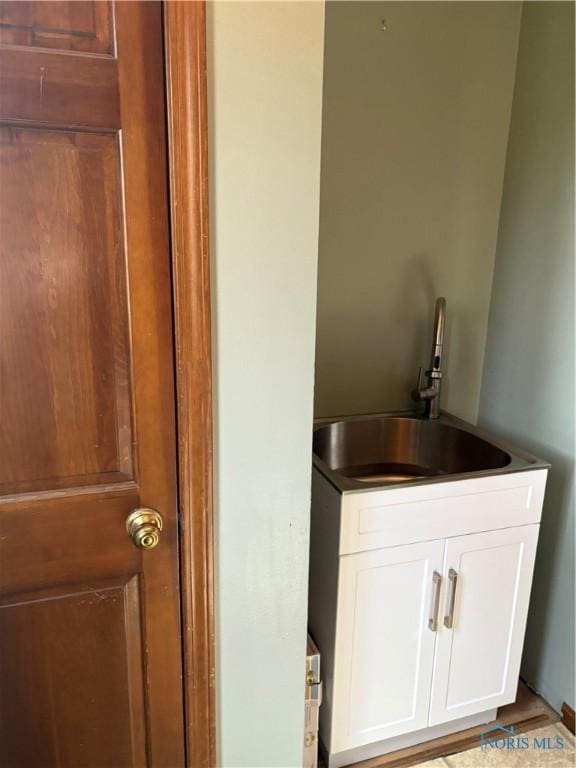 bar featuring a sink