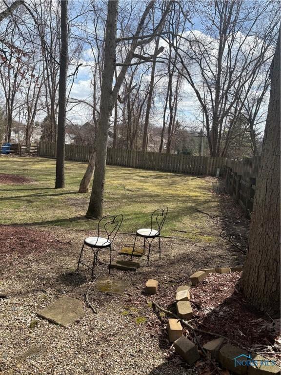 view of yard with fence