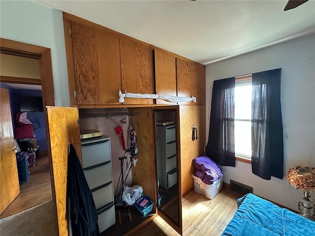 bedroom featuring wood finished floors