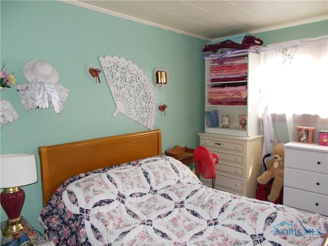 bedroom featuring ornamental molding