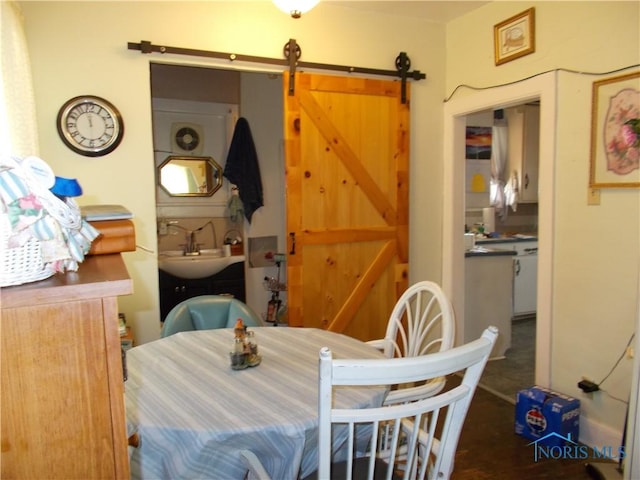 dining room with a barn door