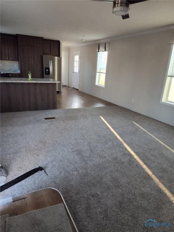 600 S Union St, Bryan, OH 43506 - garage featuring stainless steel fridge with ice dispenser