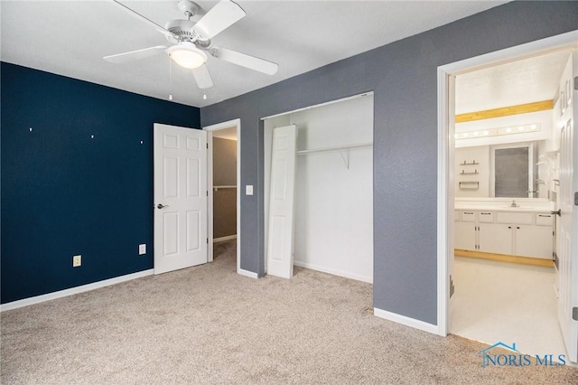 4014 Stonehenge Dr Unit 4014, Sylvania, OH 43560 - unfurnished bedroom with carpet flooring, a closet, baseboards, ceiling fan, and a sink