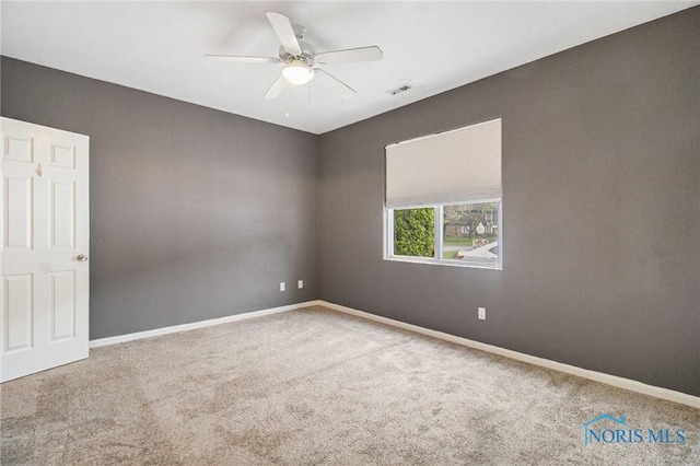 4014 Stonehenge Dr Unit 4014, Sylvania, OH 43560 - unfurnished room with carpet floors, a ceiling fan, and baseboards