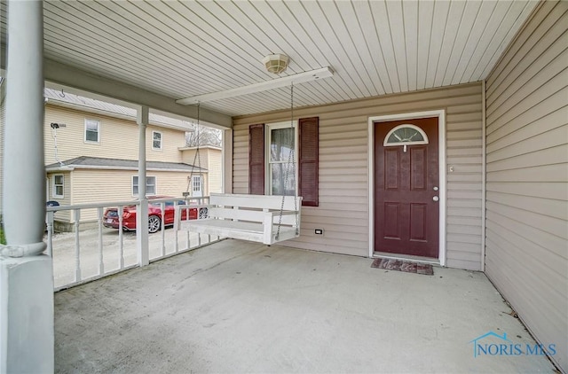 406 N Main St, Continental, OH 45831 - entrance to property with an attached carport and a porch