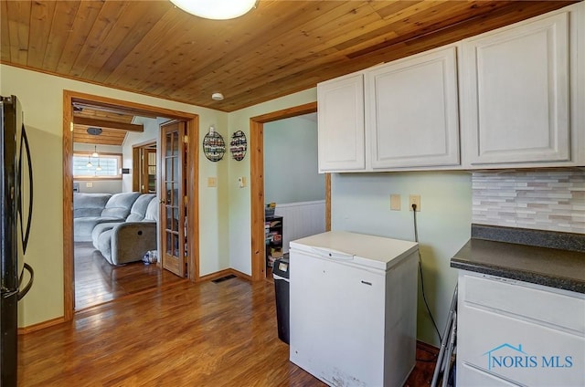 406 N Main St, Continental, OH 45831 - laundry area with visible vents, wood finished floors, and wooden ceiling