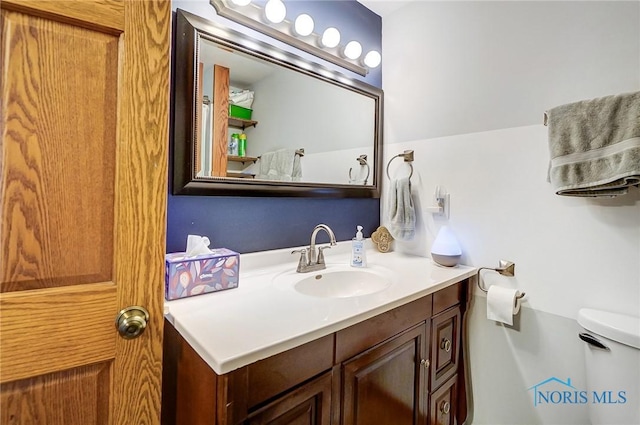 406 N Main St, Continental, OH 45831 - bathroom featuring toilet and vanity