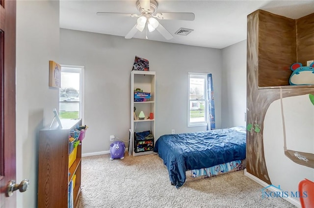 406 N Main St, Continental, OH 45831 - bedroom featuring baseboards, visible vents, ceiling fan, and carpet flooring