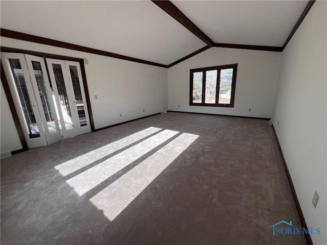 spare room with french doors, lofted ceiling with beams, baseboards, and carpet flooring